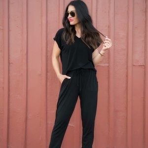 Black jumsuit with pockets.